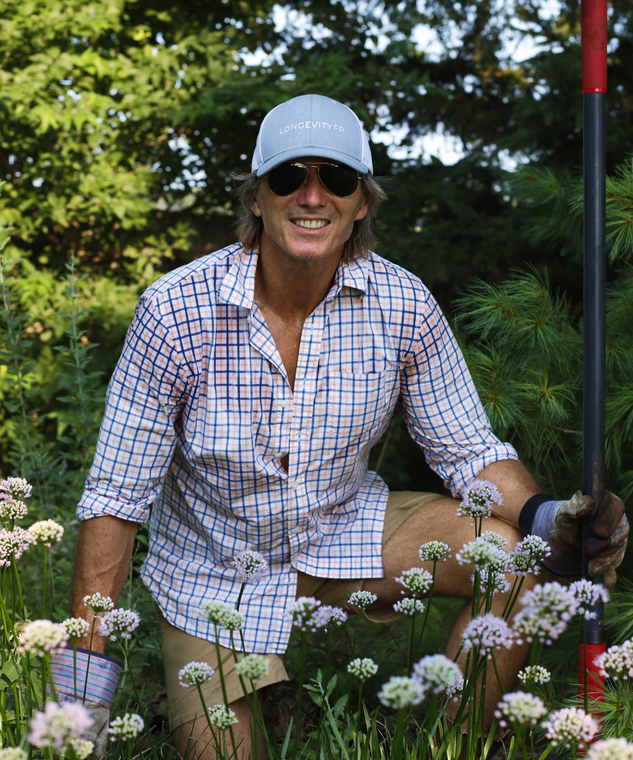 Jon Sabes in the garden with the book